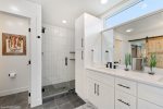 Gorgeous walk in shower & large his and her vanity 